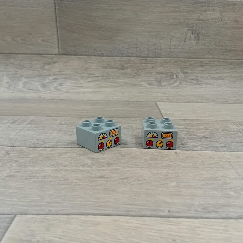 Duplo blok met afbeelding lichtgrijs knoppen van oven of fornuis