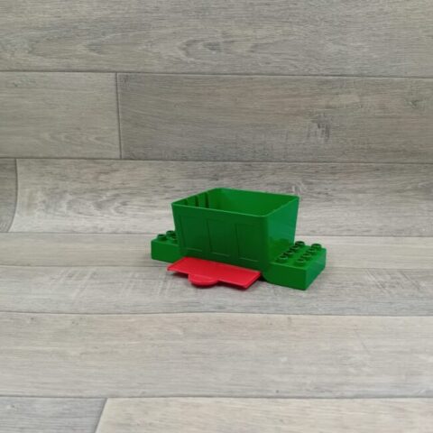 Duplo groene bak van stortsilo met rode schuif