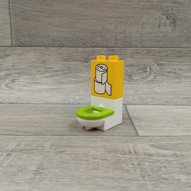 Duplo wit toilet wc met limoengroene bril en toiletrollen